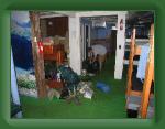 AmicalolaToUnicoi 031 * Justin packing up his pack in the hostle * 1600 x 1200 * (577KB)